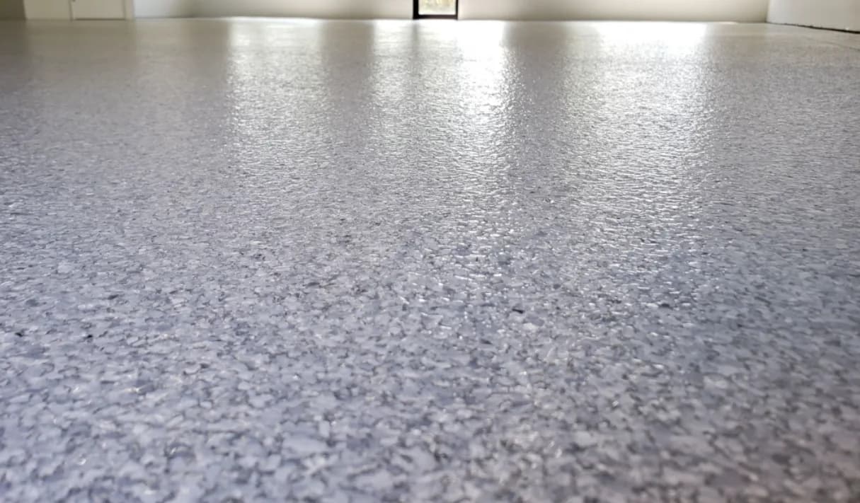 Light reflecting off a finished polyaspartic topcoat