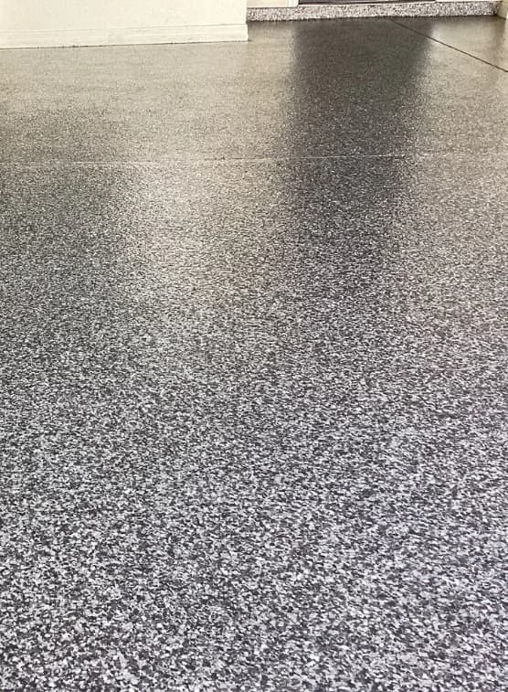 A seamless coated garage floor