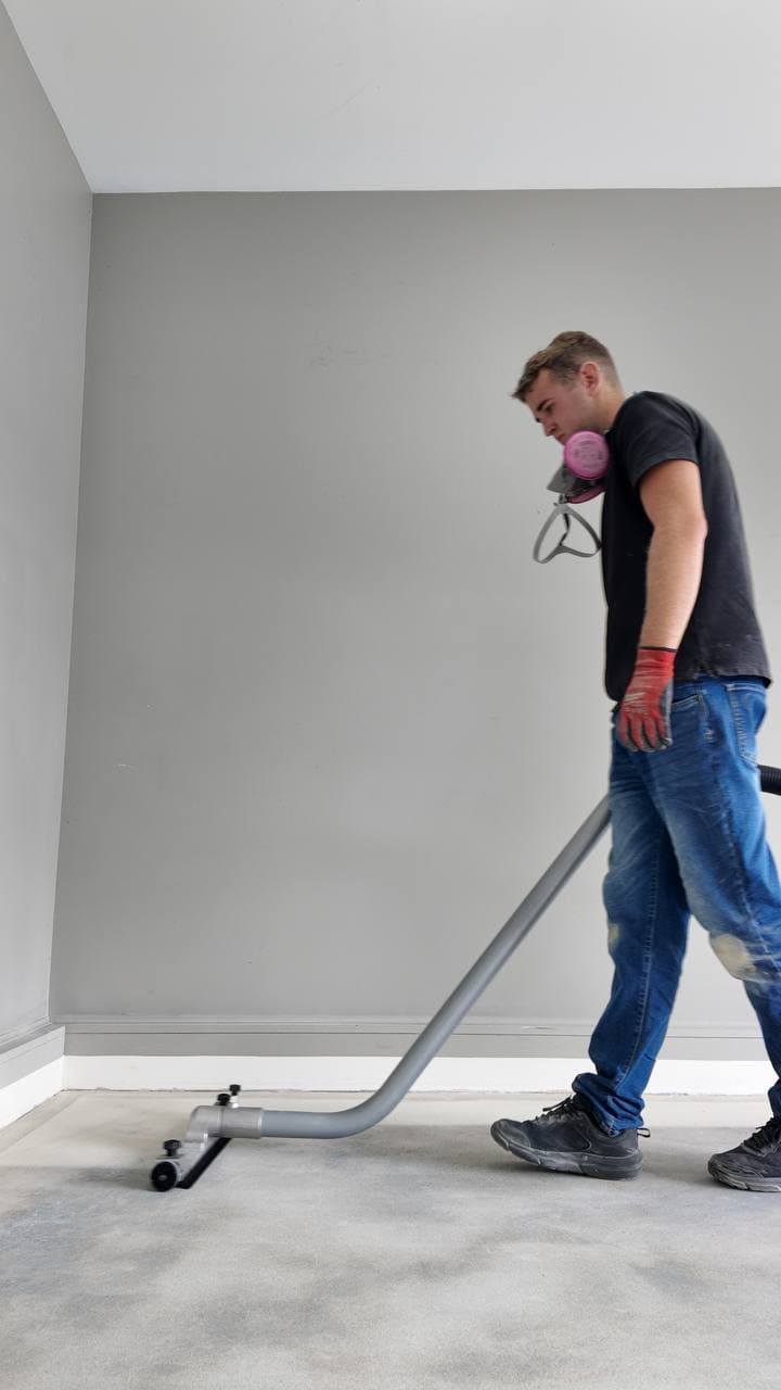 Professional grinding equipment running in a garage