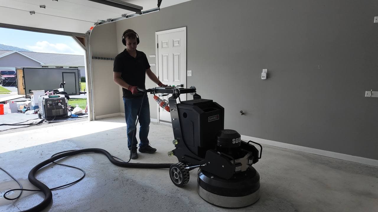 Grinding a damaged slab flat before coating