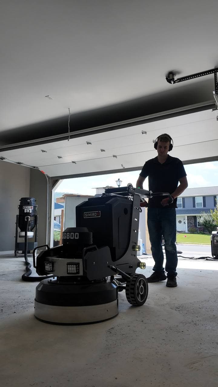 Grinding equipment removing an old floor finish