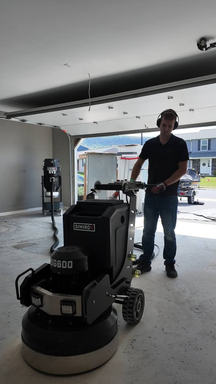 Crew coating an exterior concrete surface